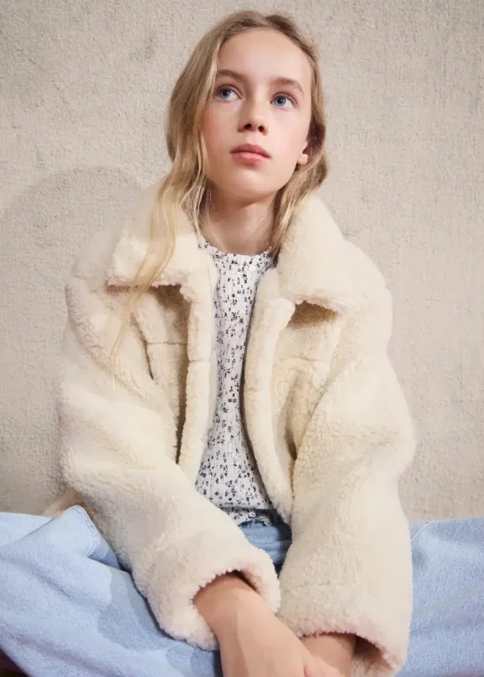 Manteau effet peau lainée