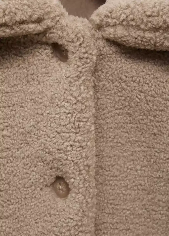 Manteau effet peau lainée