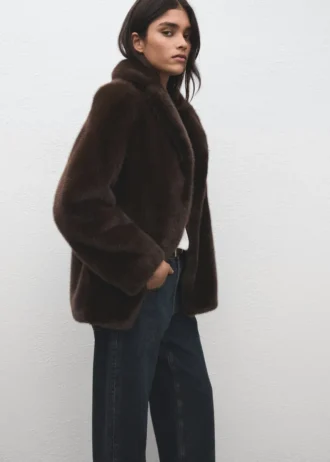 Manteau en fausse fourrure avec revers