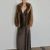 Manteau en fausse fourrure avec revers