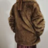 Manteau en fausse fourrure avec revers