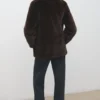 Manteau en fausse fourrure avec revers