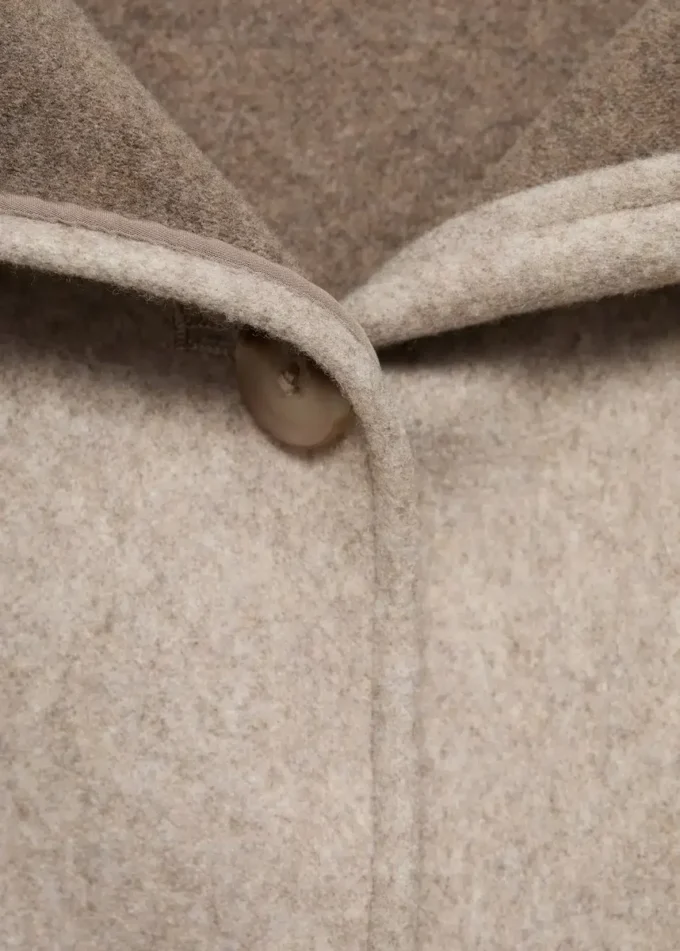 Manteau en tissu avec poches