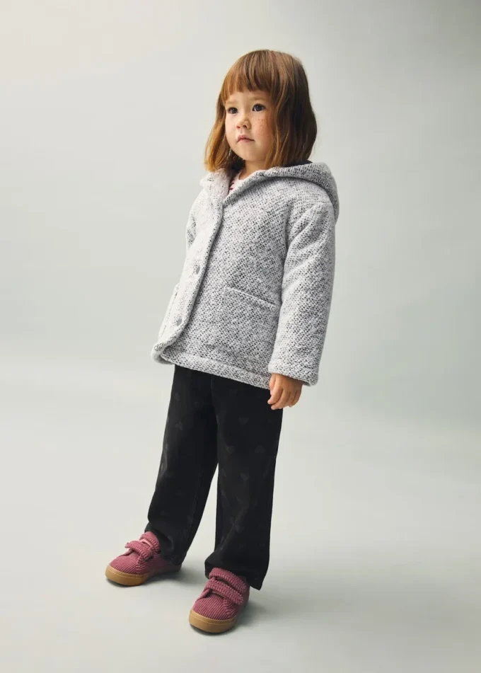 Manteau en tricot à capuche
