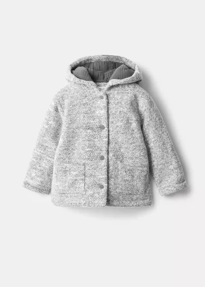 Manteau en tricot à capuche