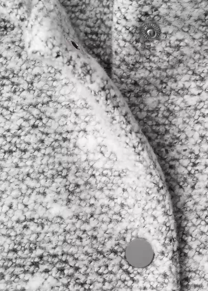 Manteau en tricot à capuche
