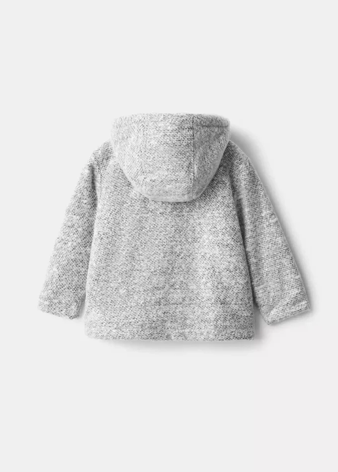 Manteau en tricot à capuche