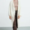 Manteau long en tricot Manteau long en tricot