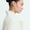 Manteau long en tricot Manteau long en tricot