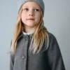 Manteau mi-long en tissu