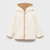 Manteau réversible double face en peluche