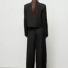 Pantalon de costume à jambes larges et plis