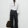 Pantalon en denim à jambes larges et plissé Pantalon en denim à jambes larges et plissé