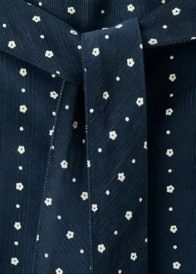 Pantalon en micro-velours côtelé à fleurs