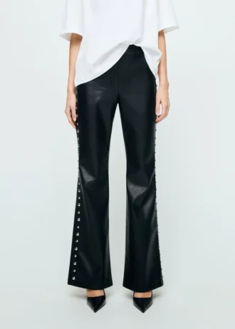 Pantalon en simili cuir clouté