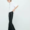 Pantalon en simili cuir clouté Pantalon en simili cuir clouté