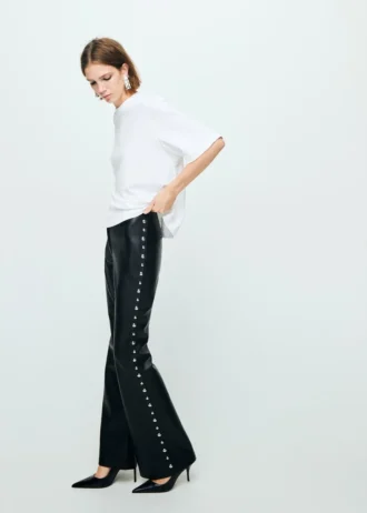 Pantalon en simili cuir clouté