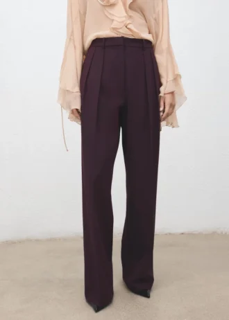 Pantalon à pinces taille mi-haute et jambes larges