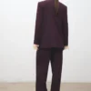 Pantalon à pinces taille mi-haute et jambes larges Pantalon à pinces taille mi-haute et jambes larges