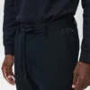 Pantalon slim en tissu extensible avec cordon de serrage Pantalon slim en tissu extensible avec cordon de serrage
