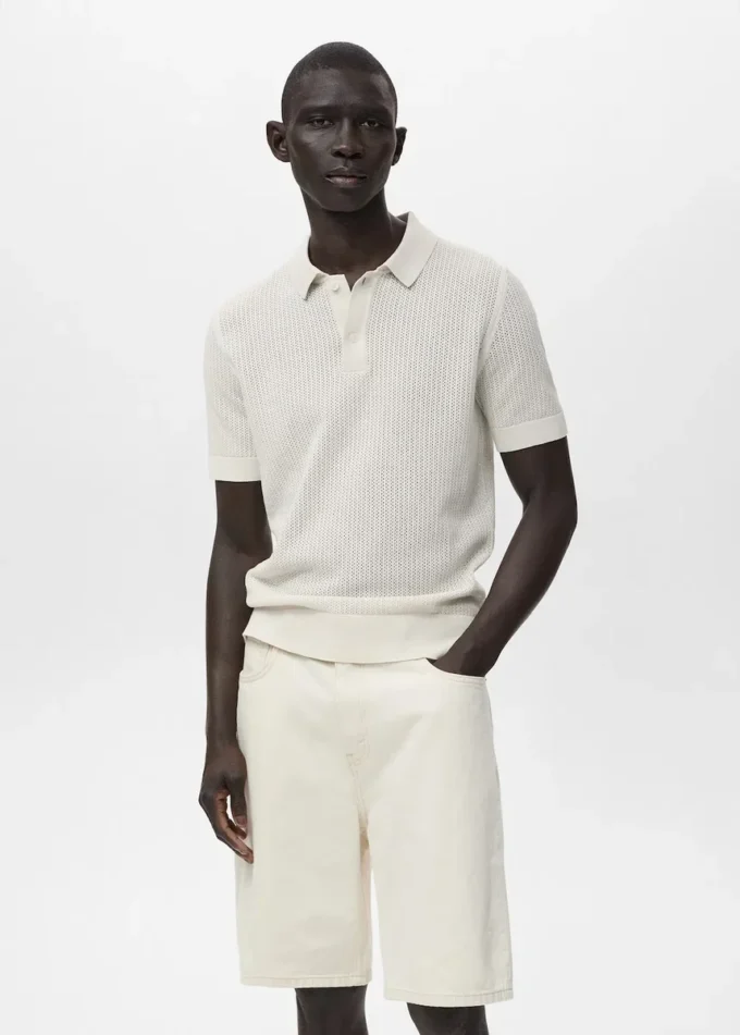 Polo en coton tricoté avec motif en dentelle Polo en coton tricoté avec motif en dentelle