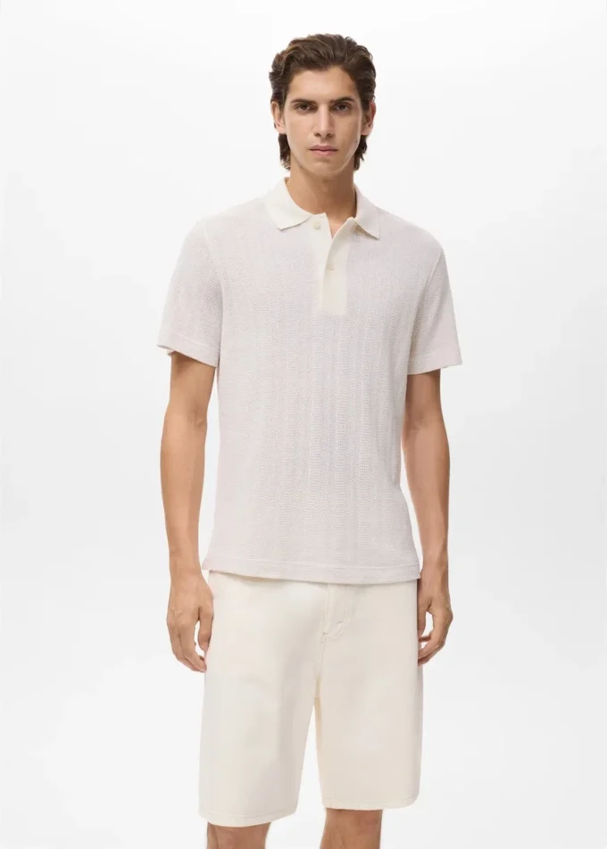 Polo en coton tricoté avec motif en dentelle Polo en coton tricoté avec motif en dentelle