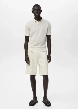 Polo en coton tricoté avec motif en dentelle