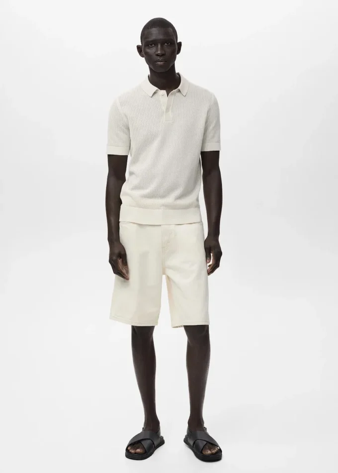 Polo en coton tricoté avec motif en dentelle Polo en coton tricoté avec motif en dentelle