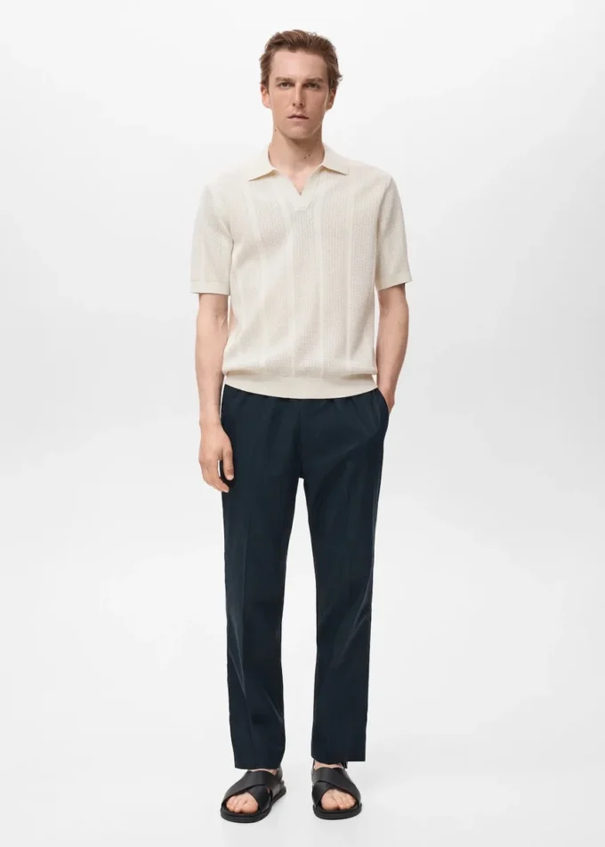 Polo en coton tricoté avec motif en dentelle Polo en coton tricoté avec motif en dentelle