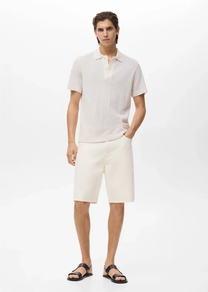 Polo en coton tricoté avec motif en dentelle Polo en coton tricoté avec motif en dentelle