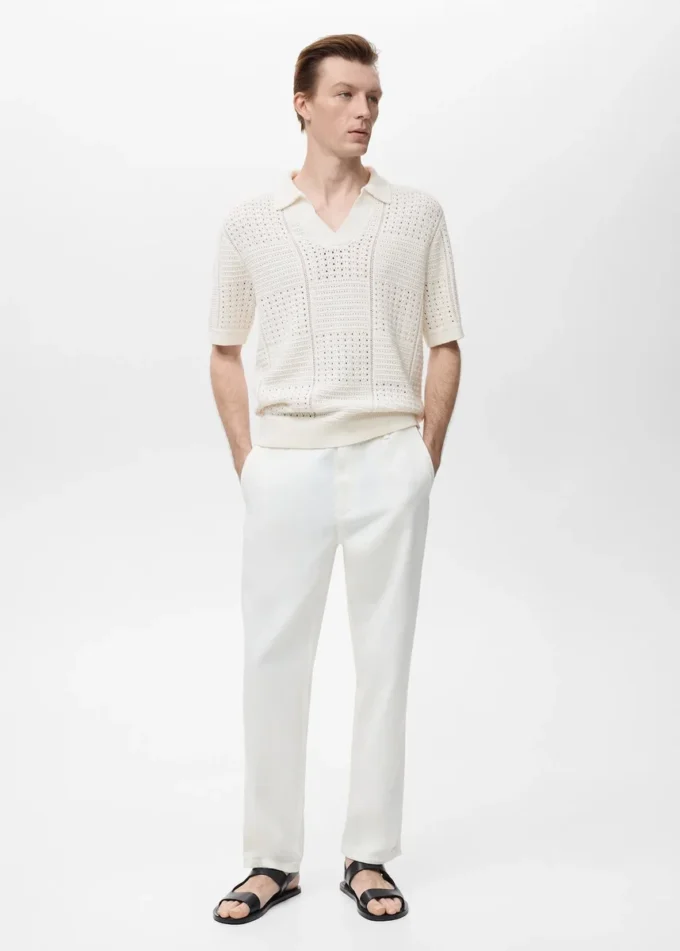 Polo en coton tricoté avec motif en dentelle Polo en coton tricoté avec motif en dentelle