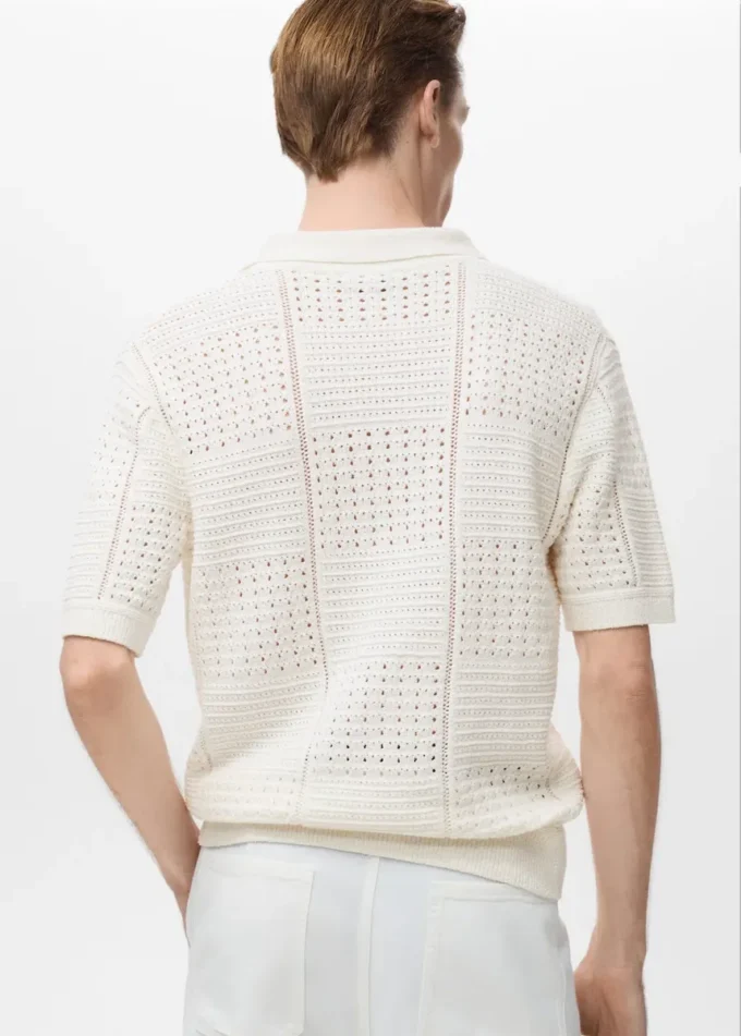Polo en coton tricoté avec motif en dentelle Polo en coton tricoté avec motif en dentelle