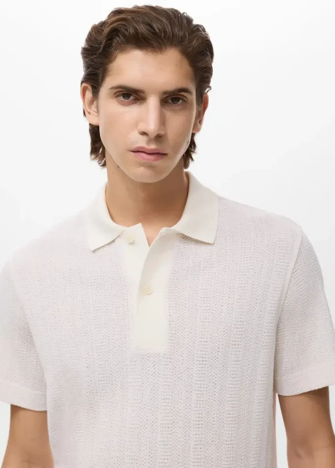 Polo en coton tricoté avec motif en dentelle Polo en coton tricoté avec motif en dentelle