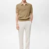 Polo en maille avec fermeture éclair et détails en dentelle Polo en maille avec fermeture éclair et détails en dentelle