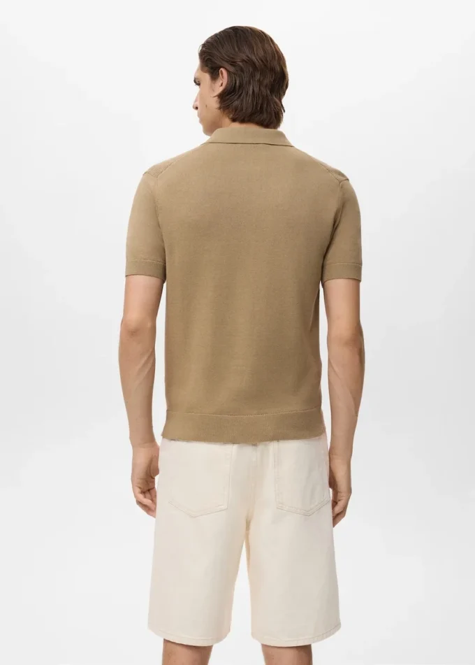 Polo en maille avec fermeture éclair et détails en dentelle Polo en maille avec fermeture éclair et détails en dentelle