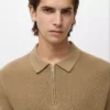 Polo en maille avec fermeture éclair et détails en dentelle Polo en maille avec fermeture éclair et détails en dentelle