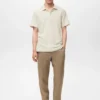 Polo en maille fine côtelée
