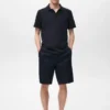 Polo en maille fine côtelée