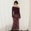Pull ajusté avec encolure drapée