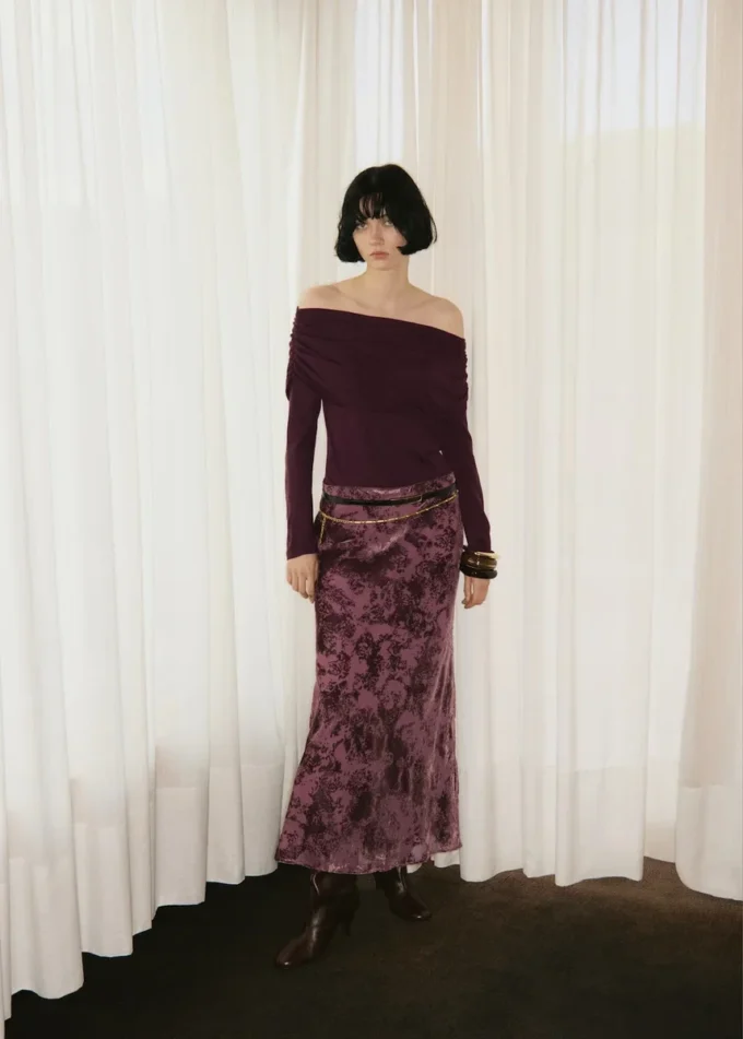 Pull ajusté avec encolure drapée