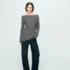 Pull asymétrique avec détails métalliques Pull asymétrique avec détails métalliques