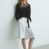 Pull à col en V avec écharpe Pull à col en V avec écharpe