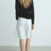 Pull à col en V avec écharpe Pull à col en V avec écharpe
