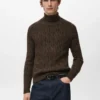 Pull à col roulé en maille torsadée