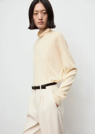 Pull à col roulé en maille torsadée