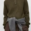 Pull à col roulé et boutons