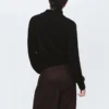Pull à col roulé et boutons