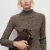 Pull à col roulé moucheté