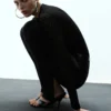 Pull en maille ajourée avec fermeture à perles