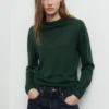 Pull en maille avec encolure drapée